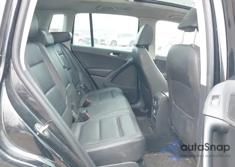 2014 Volkswagen Tiguan Sel z USA, uszkodzony, nr VIN WVGBV3AX2EW525813